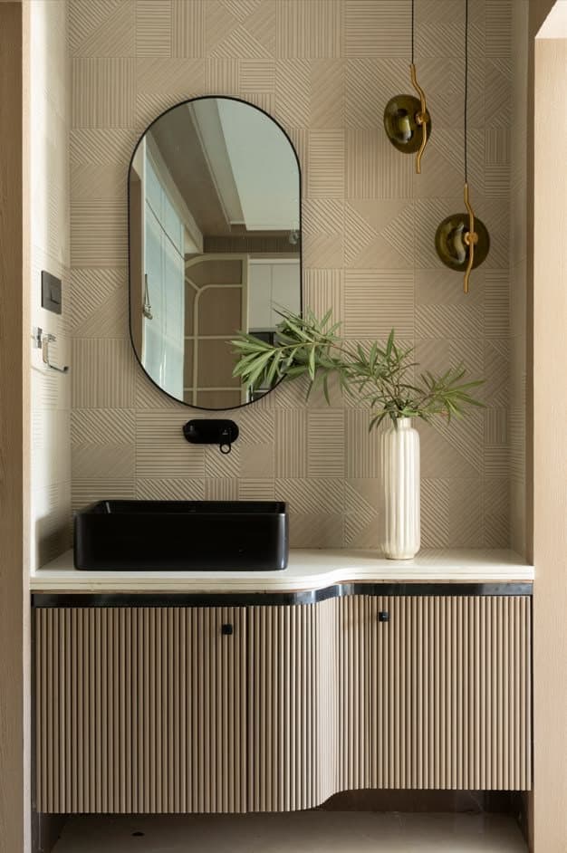 Freestanding bathtub in a dark designer suite